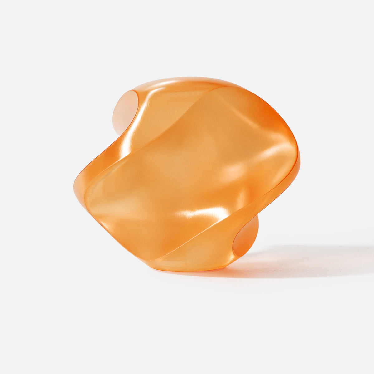INKCLOUD PETG Translucent 3D printer filament in Transparent Orange, translucent curved print sample on white
