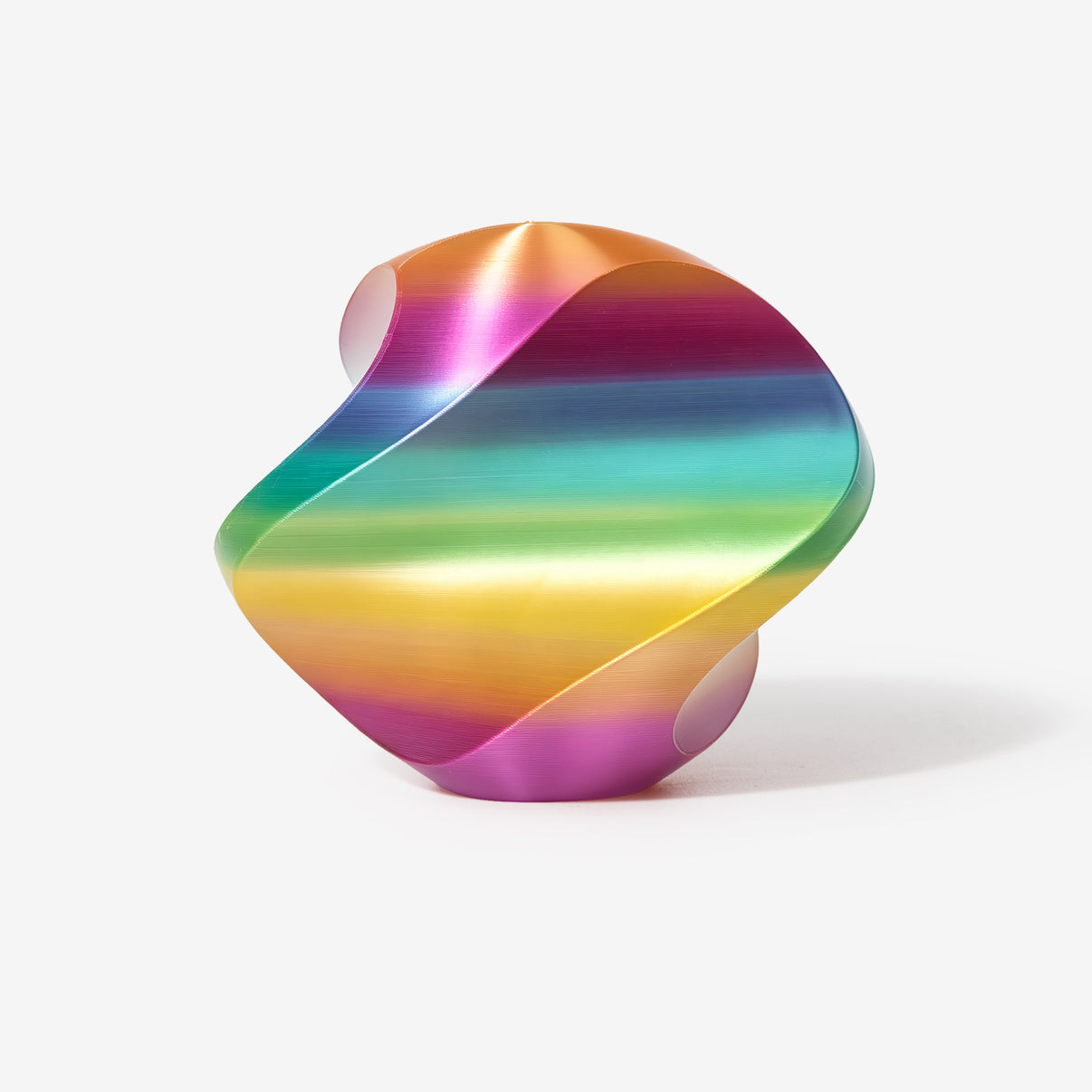 INKCLOUD PLA Silk Rainbow 3D printer filament in Rainbow 01, glossy rainbow-striped curved print sample on white