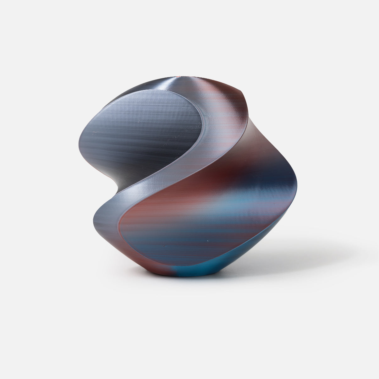 INKCLOUD PLA Silk Four-Color 3D printer filament in Red-Blue-Black-White, glossy four-color curved print sample on white