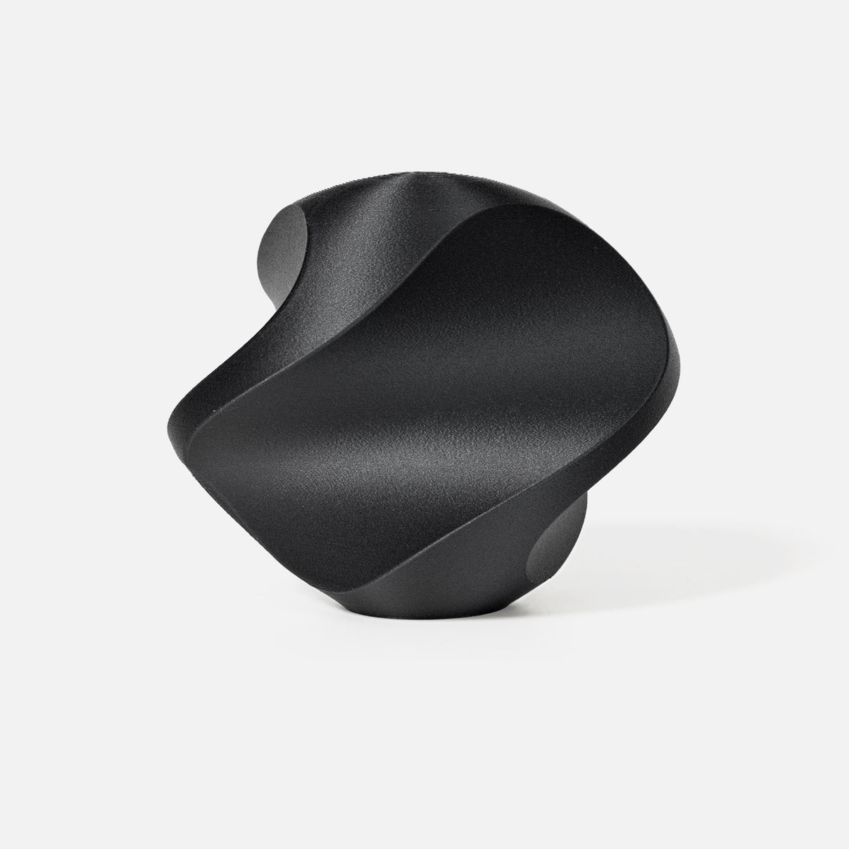 INKCLOUD PLA-CF 3D printer filament in Black, fine-textured carbon-fiber curved print sample on white